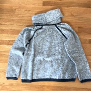 Cozy and comfy pullover sweater. 63% cotton, 37 % wool with 100% wool trimming.